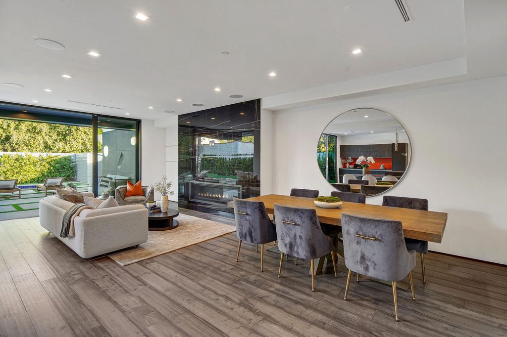 The Home in Beverly Grove is a brand-new 2021 geometric modern using an intricate blend of materials and architectural elements now available for sale. This home located at 542 N Vista St, Los Angeles, California