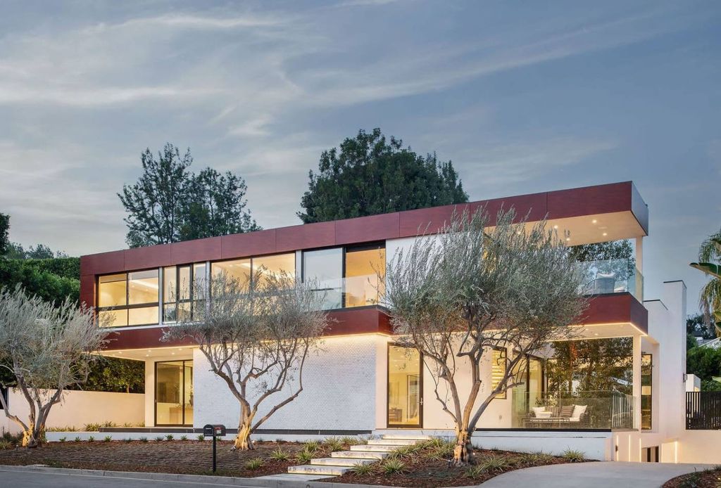 The Home in Beverly Hills is a contemporary new-build, designed by Gabbay Architects is sited behind mature olive trees now available for sale. This home located at 1729 Angelo Dr, Beverly Hills, California