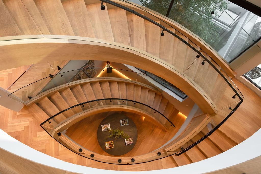 The Home in Beverly Hills is a contemporary new-build, designed by Gabbay Architects is sited behind mature olive trees now available for sale. This home located at 1729 Angelo Dr, Beverly Hills, California