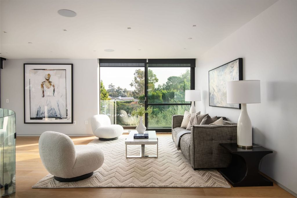The Home in Beverly Hills is a contemporary new-build, designed by Gabbay Architects is sited behind mature olive trees now available for sale. This home located at 1729 Angelo Dr, Beverly Hills, California