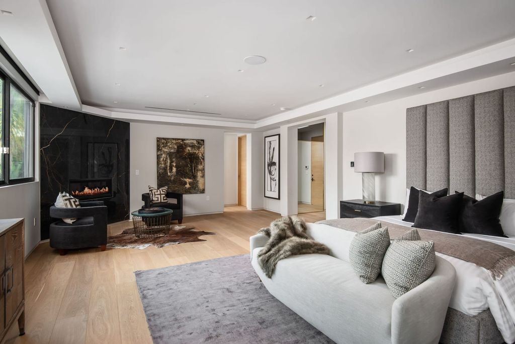 The Home in Beverly Hills is a contemporary new-build, designed by Gabbay Architects is sited behind mature olive trees now available for sale. This home located at 1729 Angelo Dr, Beverly Hills, California