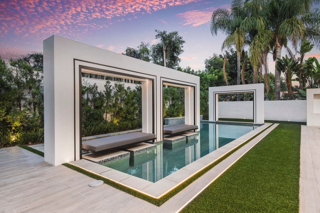 The Home in Beverly Hills is a contemporary new-build, designed by Gabbay Architects is sited behind mature olive trees now available for sale. This home located at 1729 Angelo Dr, Beverly Hills, California
