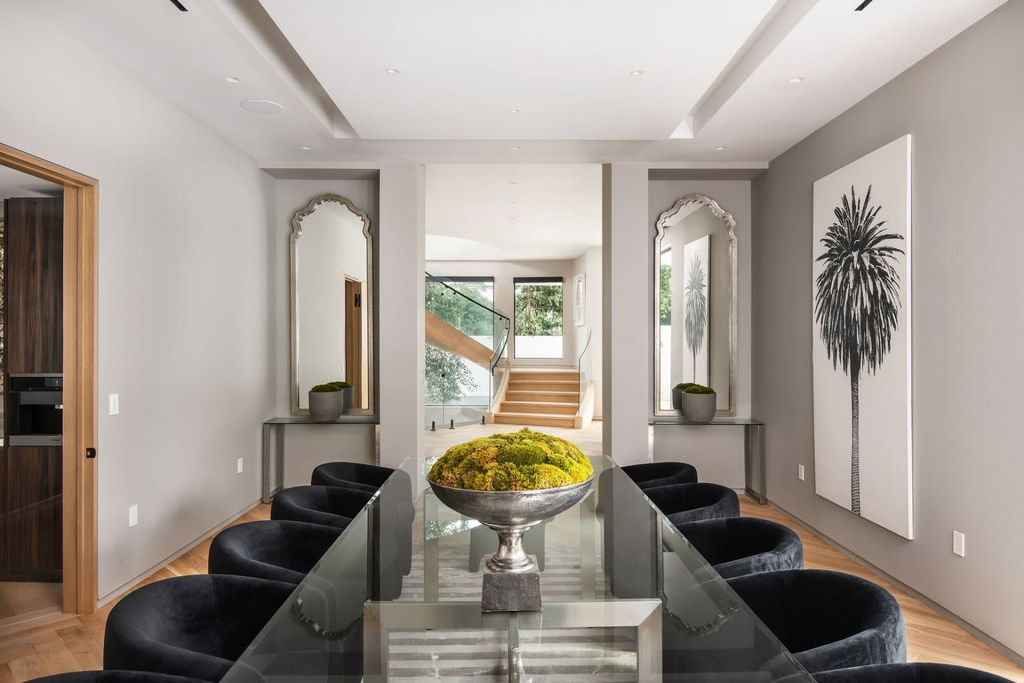 The Home in Beverly Hills is a contemporary new-build, designed by Gabbay Architects is sited behind mature olive trees now available for sale. This home located at 1729 Angelo Dr, Beverly Hills, California