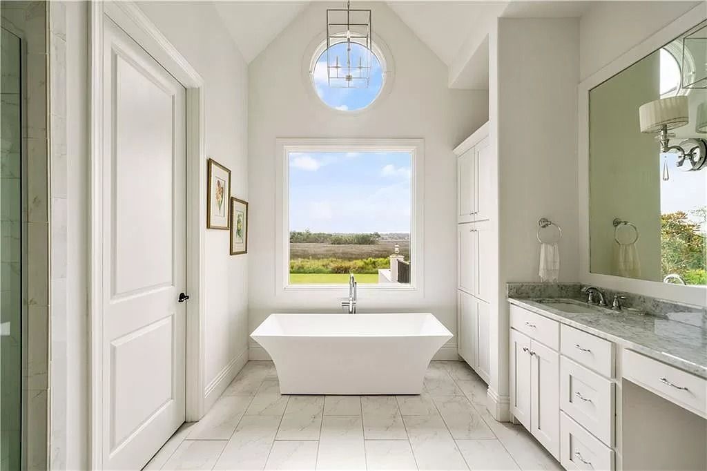 The Home in Georgia is a luxurious home which is well constructed under South Florida architecture influence now available for sale. This home located at 400 Hawkins Island Dr, Saint Simons Island, Georgia; offering 06 bedrooms and 06 bathrooms with 5,985 square feet of living spaces. 