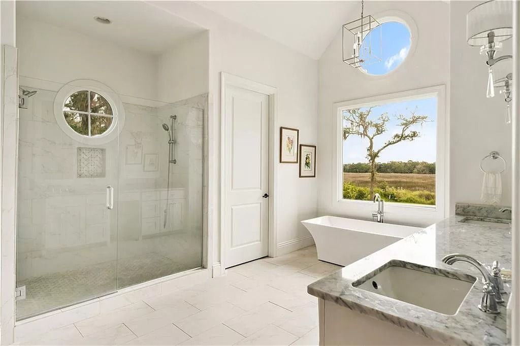 The Home in Georgia is a luxurious home which is well constructed under South Florida architecture influence now available for sale. This home located at 400 Hawkins Island Dr, Saint Simons Island, Georgia; offering 06 bedrooms and 06 bathrooms with 5,985 square feet of living spaces. 