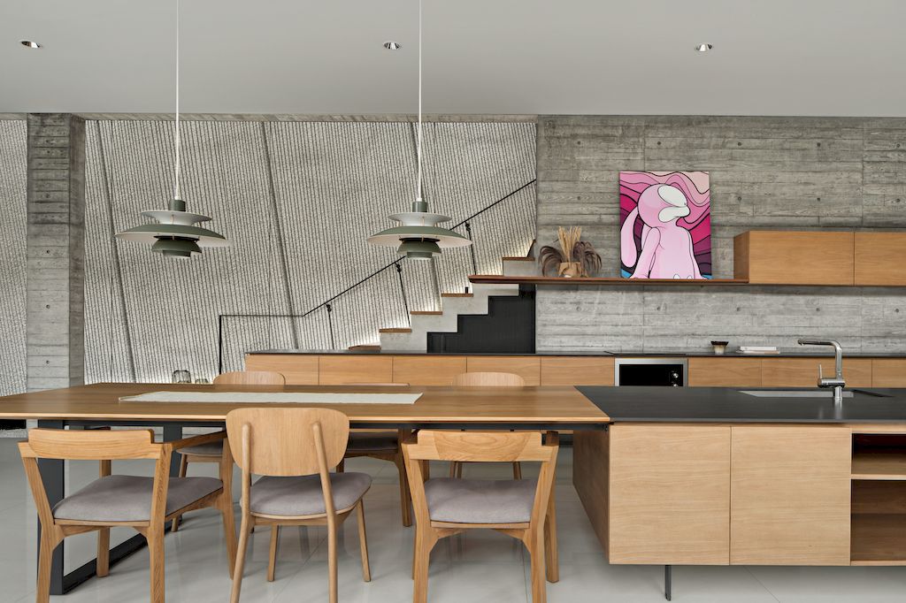 Hover House with rustic brutal of concrete Design by Pranala Associates 1