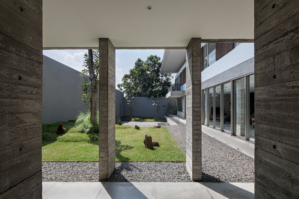 Hover House with rustic brutal of concrete Design by Pranala Associates 11