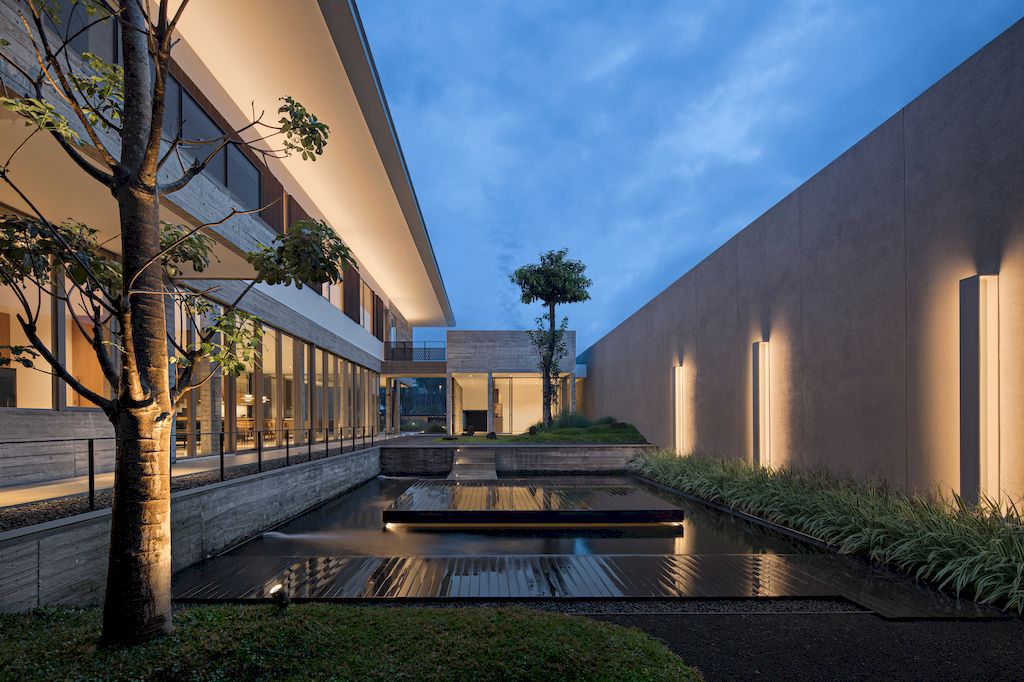 Hover House with rustic & brutal of concrete Design by Pranala Associates