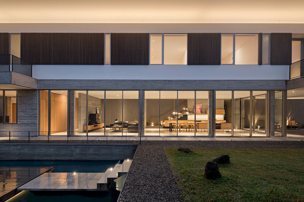 Hover House with rustic brutal of concrete Design by Pranala Associates 15