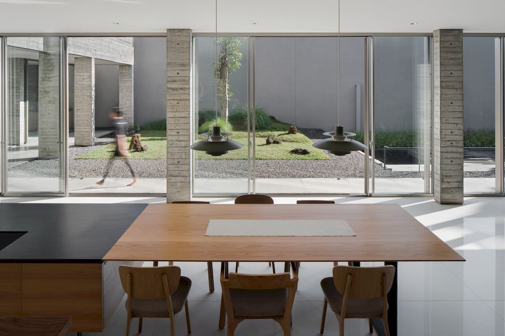 Hover House with rustic brutal of concrete Design by Pranala Associates 19