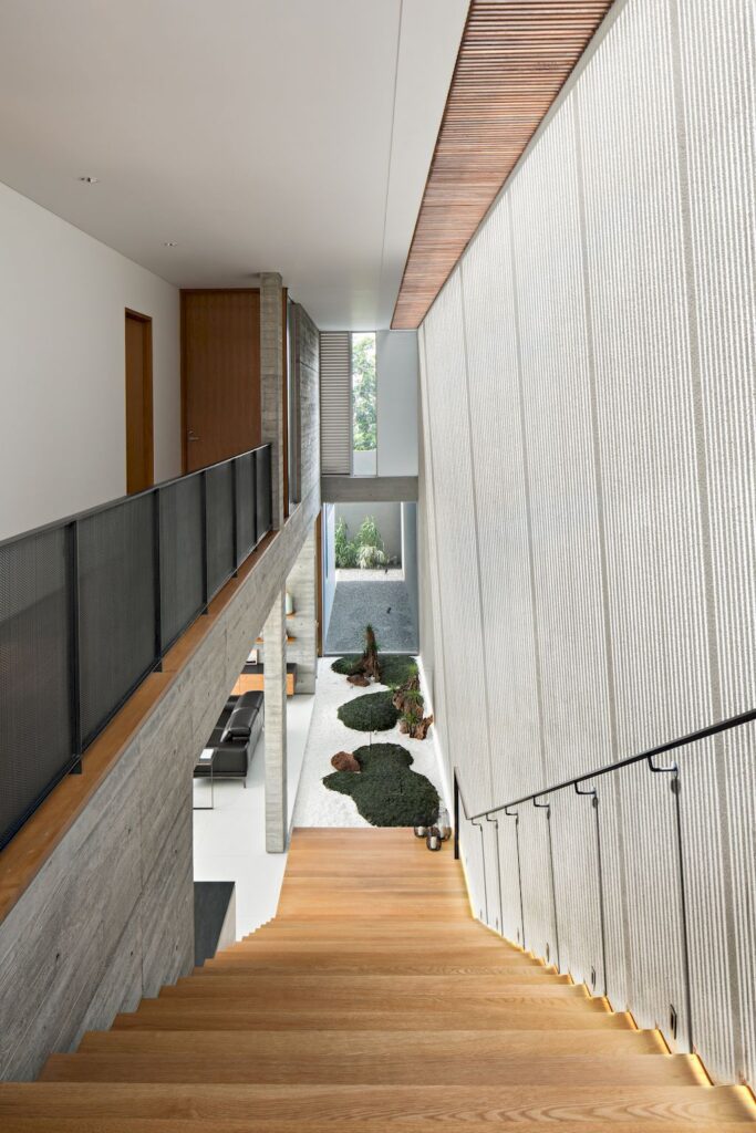 Hover House with rustic brutal of concrete Design by Pranala Associates 25