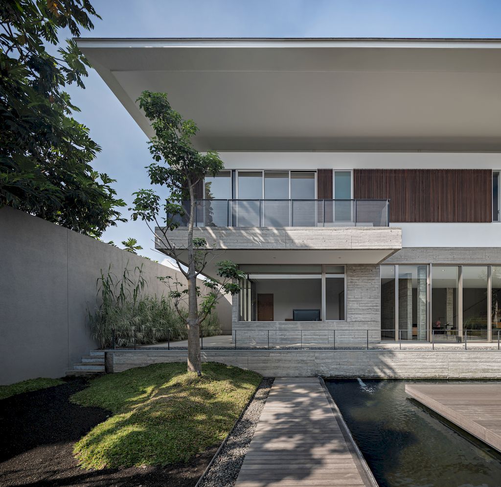 Hover House with rustic brutal of concrete Design by Pranala Associates 9