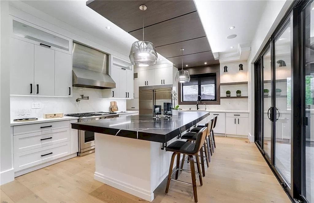 The Contemporary Custom Home in Ontario is a luxurious home now available for sale. This home located at 2450 Meadowood Cres, Oakville, ON L6L 1V6, Canada