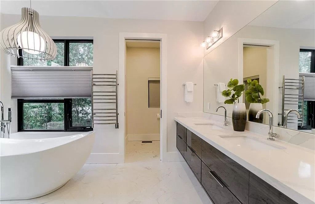 The Contemporary Custom Home in Ontario is a luxurious home now available for sale. This home located at 2450 Meadowood Cres, Oakville, ON L6L 1V6, Canada