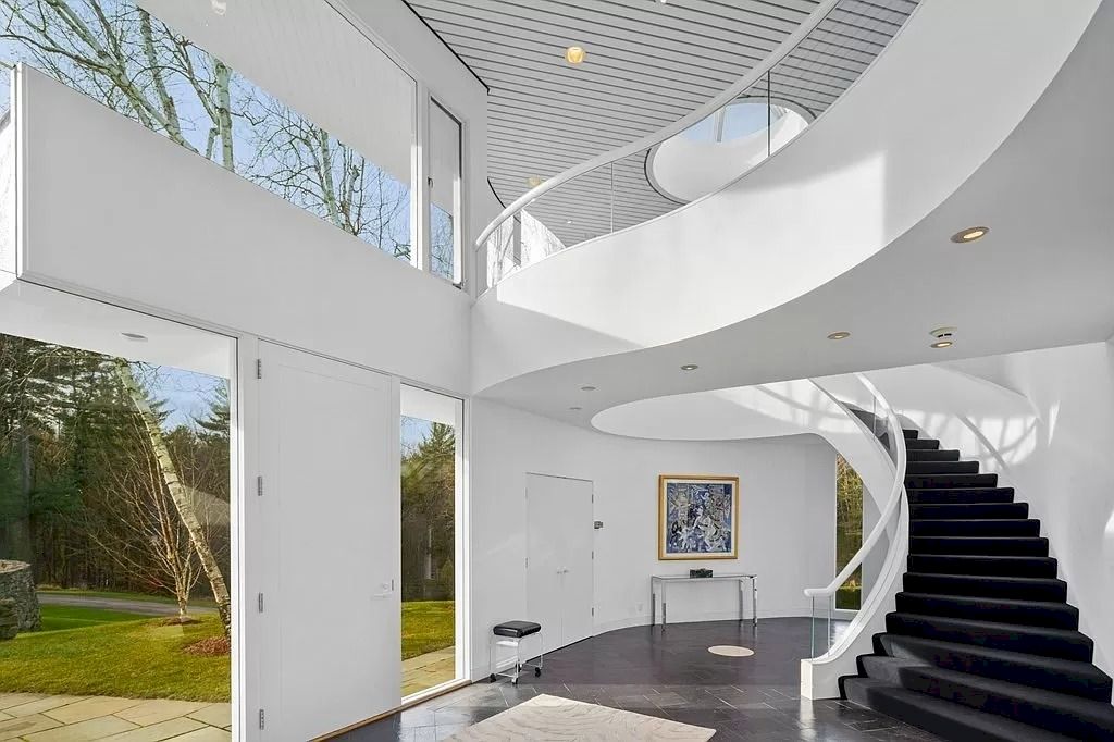 The Home in Massachusetts is a luxurious home offering large scale entertaining and comfortable living now available for sale. This home located at 201 Concord St, Carlisle, Massachusetts; offering 05 bedrooms and 08 bathrooms with 15,193 square feet of living spaces.