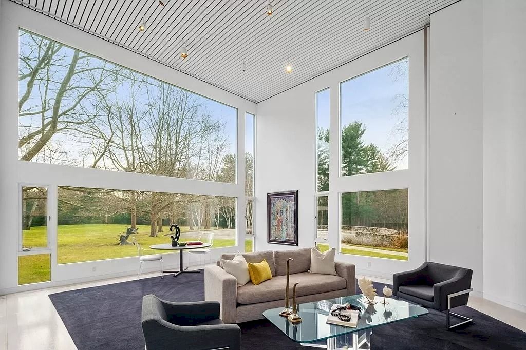 The Home in Massachusetts is a luxurious home offering large scale entertaining and comfortable living now available for sale. This home located at 201 Concord St, Carlisle, Massachusetts; offering 05 bedrooms and 08 bathrooms with 15,193 square feet of living spaces.