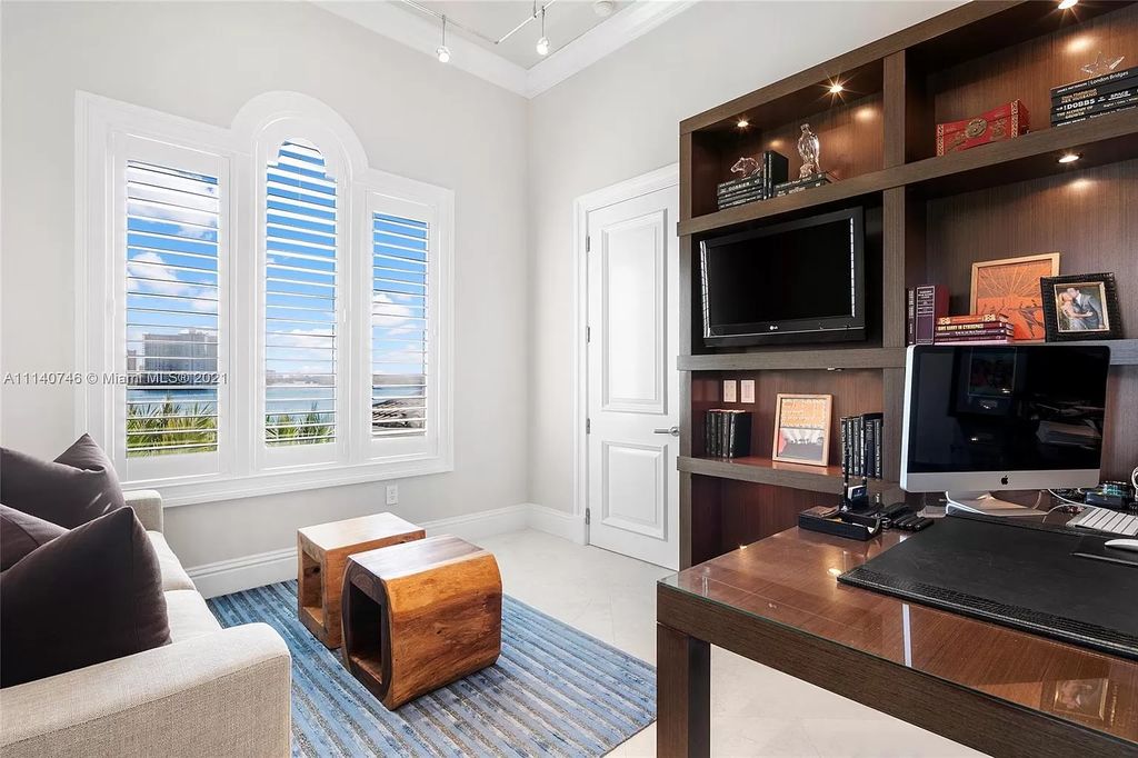 The Miami Beach Home is a unique tri-level estates sits along 251 feet of wide bay views and has 2 deeded docks now available for sale. This house located at 042 Island Estates Dr, North Miami Beach, Florida