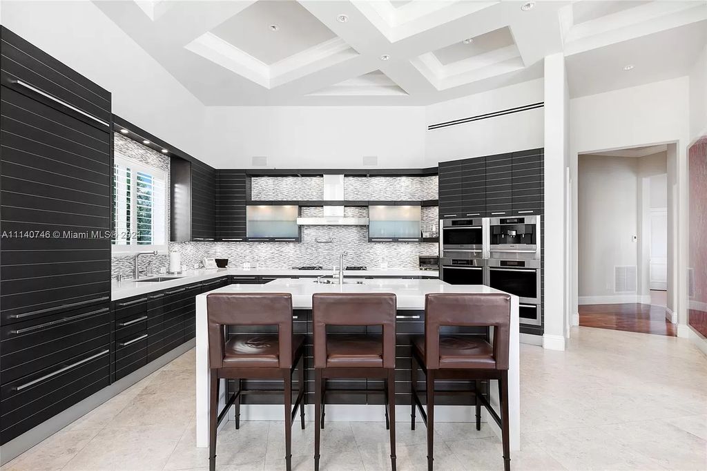 The Miami Beach Home is a unique tri-level estates sits along 251 feet of wide bay views and has 2 deeded docks now available for sale. This house located at 042 Island Estates Dr, North Miami Beach, Florida