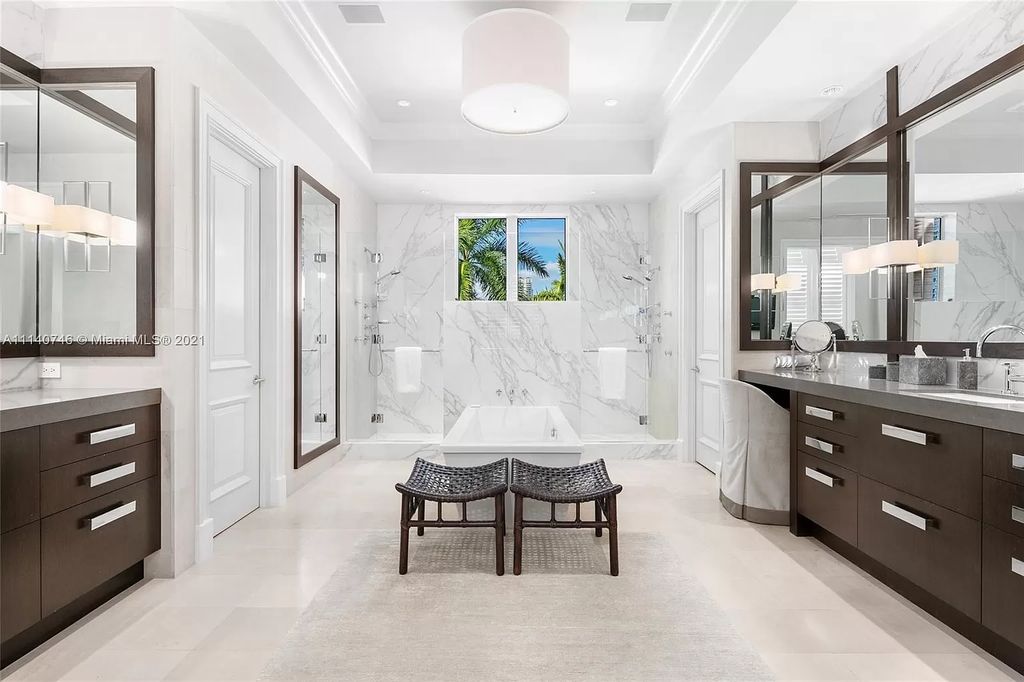 The Miami Beach Home is a unique tri-level estates sits along 251 feet of wide bay views and has 2 deeded docks now available for sale. This house located at 042 Island Estates Dr, North Miami Beach, Florida