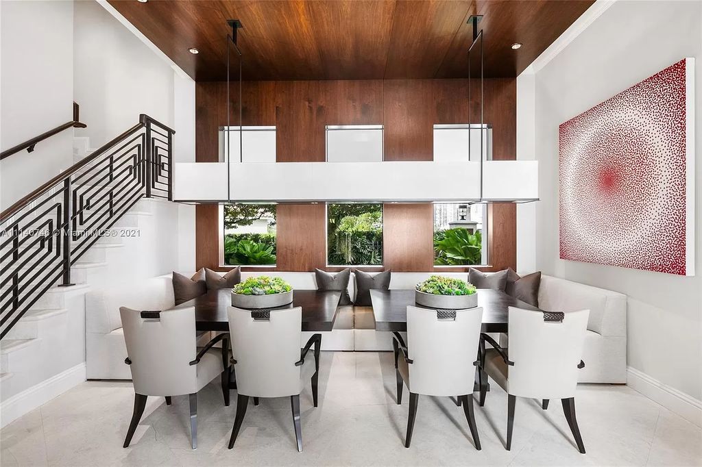 The Miami Beach Home is a unique tri-level estates sits along 251 feet of wide bay views and has 2 deeded docks now available for sale. This house located at 042 Island Estates Dr, North Miami Beach, Florida