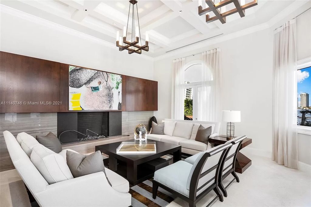 The Miami Beach Home is a unique tri-level estates sits along 251 feet of wide bay views and has 2 deeded docks now available for sale. This house located at 042 Island Estates Dr, North Miami Beach, Florida