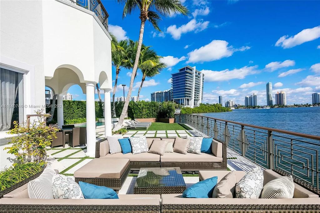 The Miami Beach Home is a unique tri-level estates sits along 251 feet of wide bay views and has 2 deeded docks now available for sale. This house located at 042 Island Estates Dr, North Miami Beach, Florida