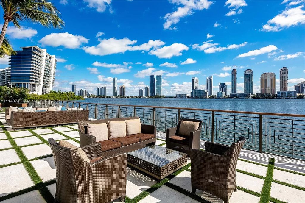 The Miami Beach Home is a unique tri-level estates sits along 251 feet of wide bay views and has 2 deeded docks now available for sale. This house located at 042 Island Estates Dr, North Miami Beach, Florida