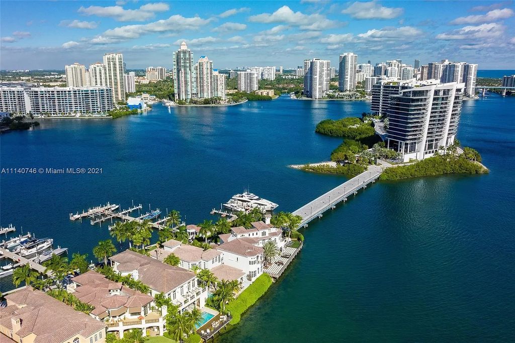 The Miami Beach Home is a unique tri-level estates sits along 251 feet of wide bay views and has 2 deeded docks now available for sale. This house located at 042 Island Estates Dr, North Miami Beach, Florida