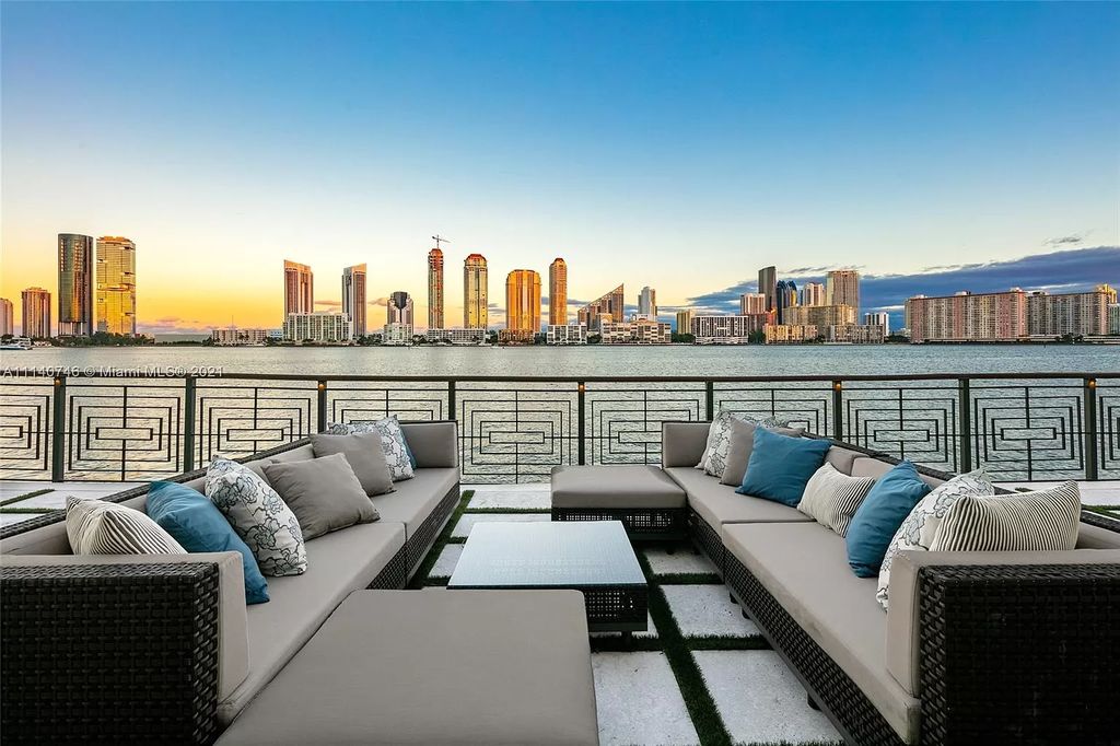 The Miami Beach Home is a unique tri-level estates sits along 251 feet of wide bay views and has 2 deeded docks now available for sale. This house located at 042 Island Estates Dr, North Miami Beach, Florida