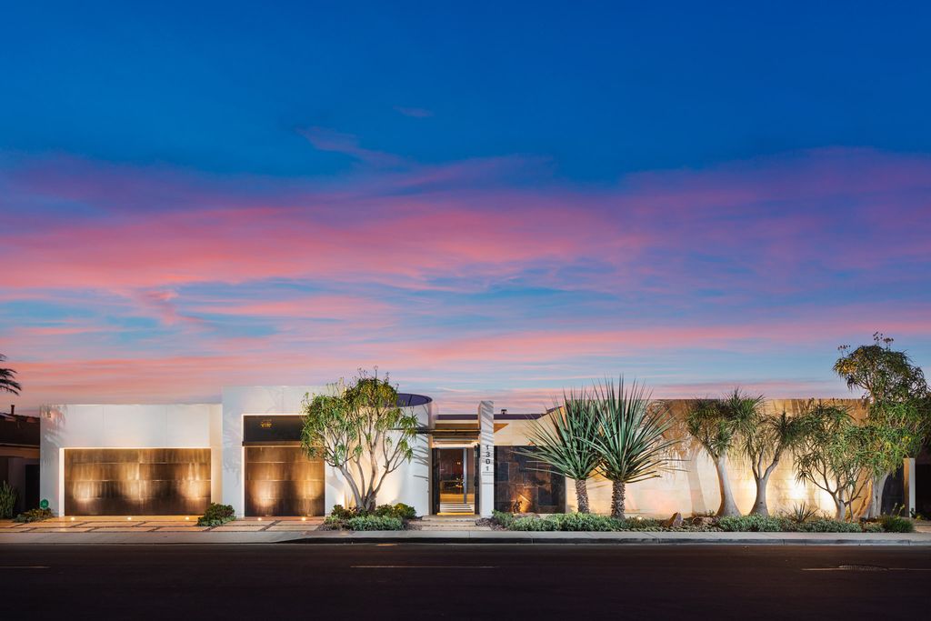 The Home in Corona Del Mar is an unparalleled design and unrivaled construction quality with explosive front-row panoramic views now available for sale. This house located at 1301 Dolphin Ter, Corona Del Mar, California