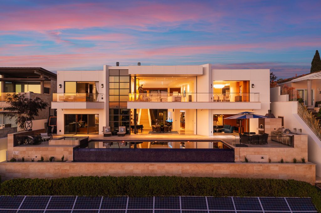The Home in Corona Del Mar is an unparalleled design and unrivaled construction quality with explosive front-row panoramic views now available for sale. This house located at 1301 Dolphin Ter, Corona Del Mar, California