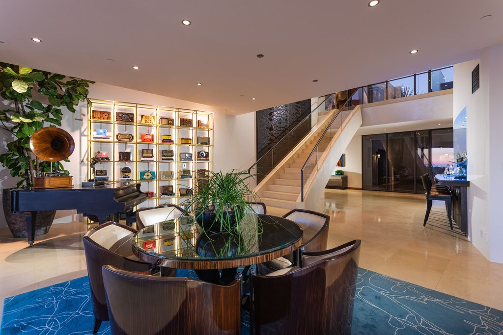 The Home in Corona Del Mar is an unparalleled design and unrivaled construction quality with explosive front-row panoramic views now available for sale. This house located at 1301 Dolphin Ter, Corona Del Mar, California