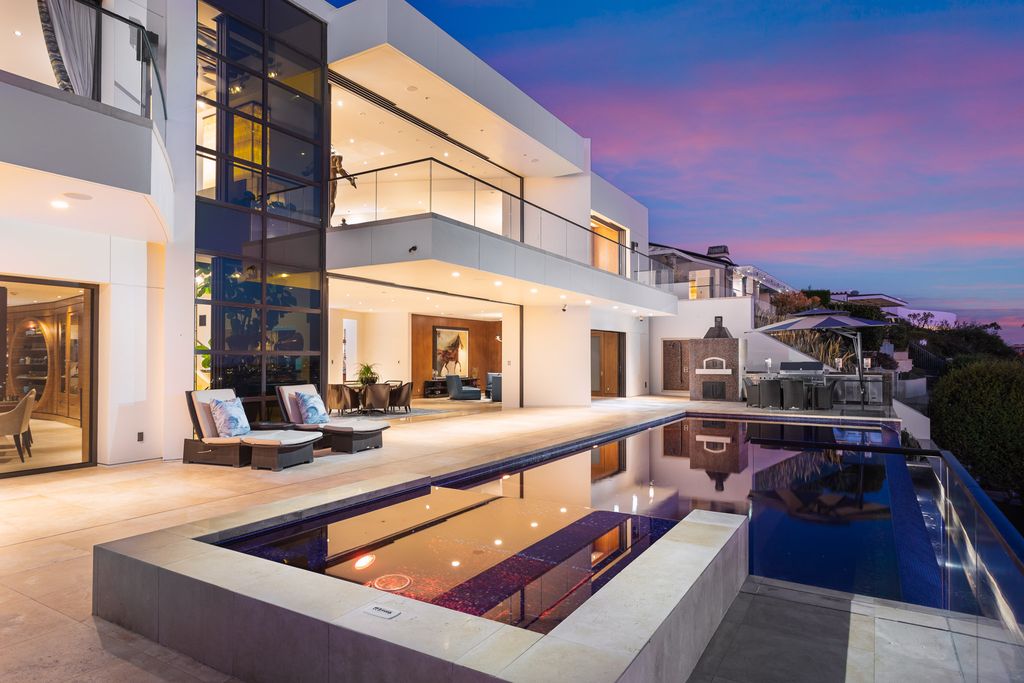 The Home in Corona Del Mar is an unparalleled design and unrivaled construction quality with explosive front-row panoramic views now available for sale. This house located at 1301 Dolphin Ter, Corona Del Mar, California