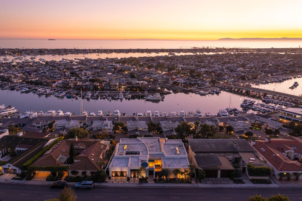 The Home in Corona Del Mar is an unparalleled design and unrivaled construction quality with explosive front-row panoramic views now available for sale. This house located at 1301 Dolphin Ter, Corona Del Mar, California