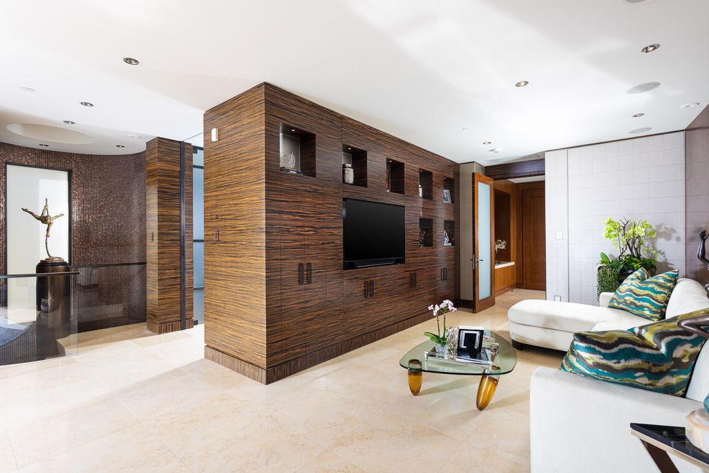 The Home in Corona Del Mar is an unparalleled design and unrivaled construction quality with explosive front-row panoramic views now available for sale. This house located at 1301 Dolphin Ter, Corona Del Mar, California