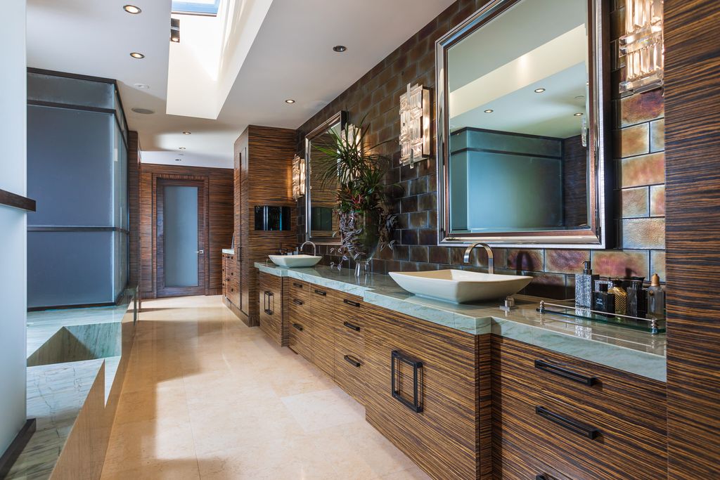 The Home in Corona Del Mar is an unparalleled design and unrivaled construction quality with explosive front-row panoramic views now available for sale. This house located at 1301 Dolphin Ter, Corona Del Mar, California