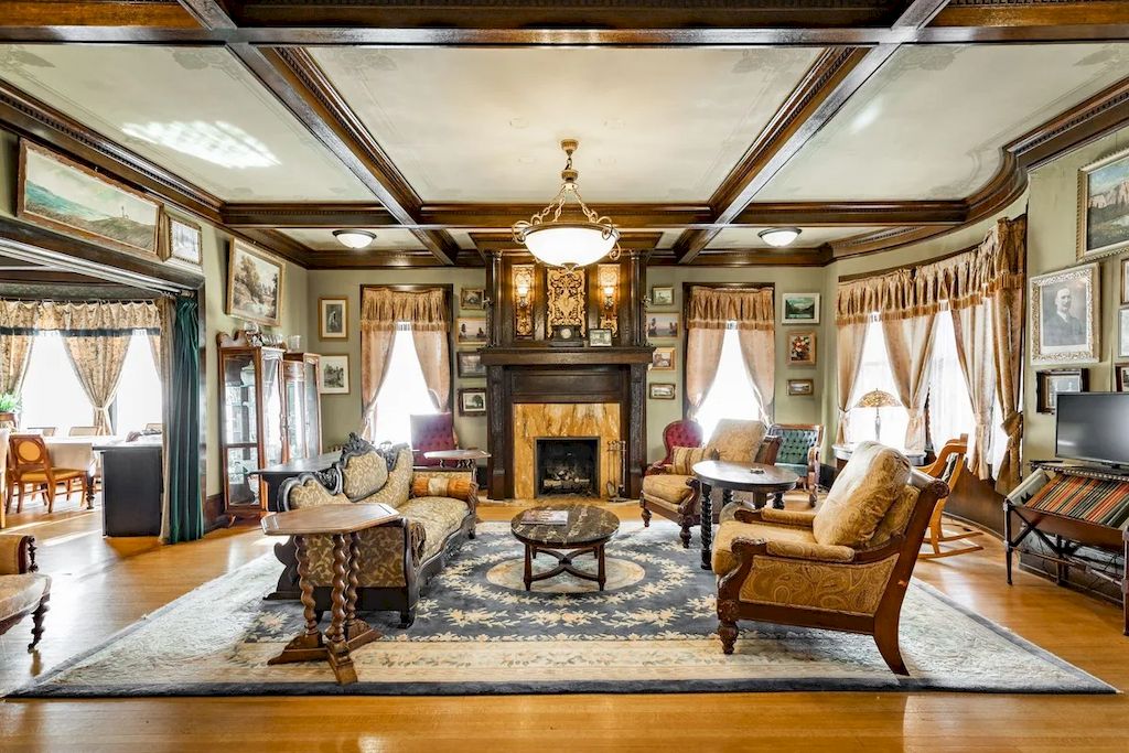 The Home in Michigan is a luxurious home currently being operated as a turn-key bed & breakfast vacation retreat now available for sale. This home located at 320 Tamarack St, Laurium, Michigan; offering 36 bedrooms and 11 bathrooms with 37,880 square feet of living spaces.