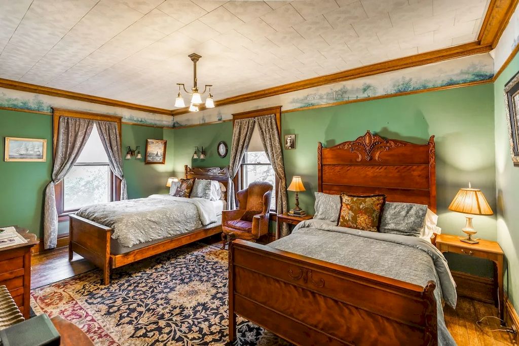 The Home in Michigan is a luxurious home currently being operated as a turn-key bed & breakfast vacation retreat now available for sale. This home located at 320 Tamarack St, Laurium, Michigan; offering 36 bedrooms and 11 bathrooms with 37,880 square feet of living spaces.