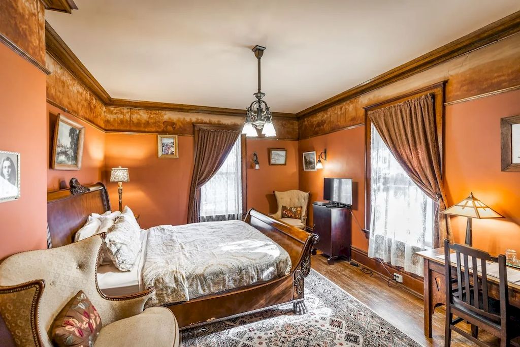 The Home in Michigan is a luxurious home currently being operated as a turn-key bed & breakfast vacation retreat now available for sale. This home located at 320 Tamarack St, Laurium, Michigan; offering 36 bedrooms and 11 bathrooms with 37,880 square feet of living spaces.