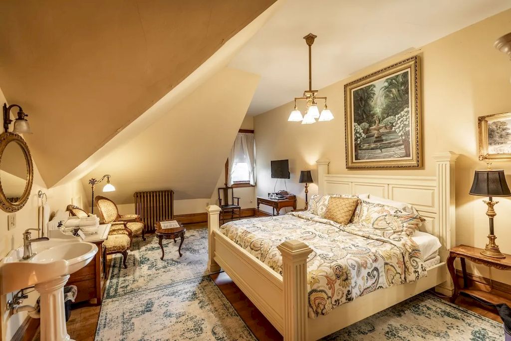 The Home in Michigan is a luxurious home currently being operated as a turn-key bed & breakfast vacation retreat now available for sale. This home located at 320 Tamarack St, Laurium, Michigan; offering 36 bedrooms and 11 bathrooms with 37,880 square feet of living spaces.