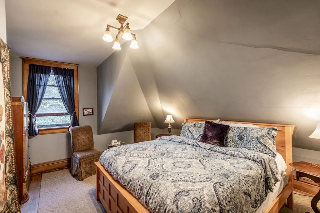The Home in Michigan is a luxurious home currently being operated as a turn-key bed & breakfast vacation retreat now available for sale. This home located at 320 Tamarack St, Laurium, Michigan; offering 36 bedrooms and 11 bathrooms with 37,880 square feet of living spaces.