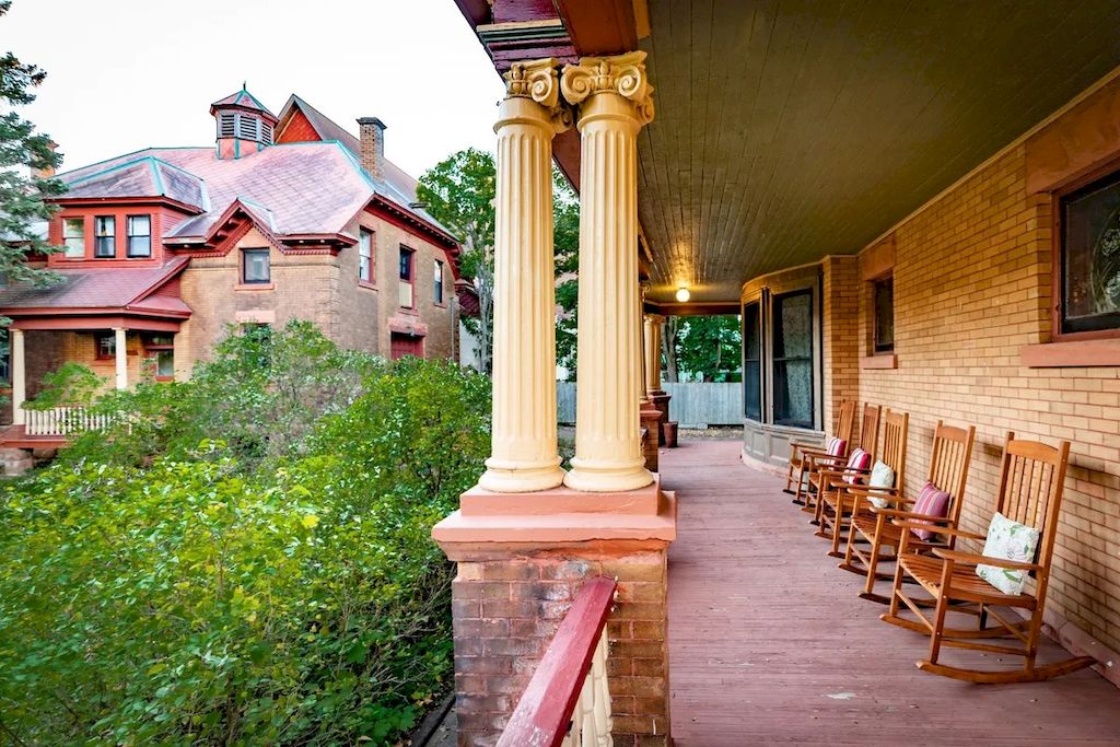 The Home in Michigan is a luxurious home currently being operated as a turn-key bed & breakfast vacation retreat now available for sale. This home located at 320 Tamarack St, Laurium, Michigan; offering 36 bedrooms and 11 bathrooms with 37,880 square feet of living spaces.