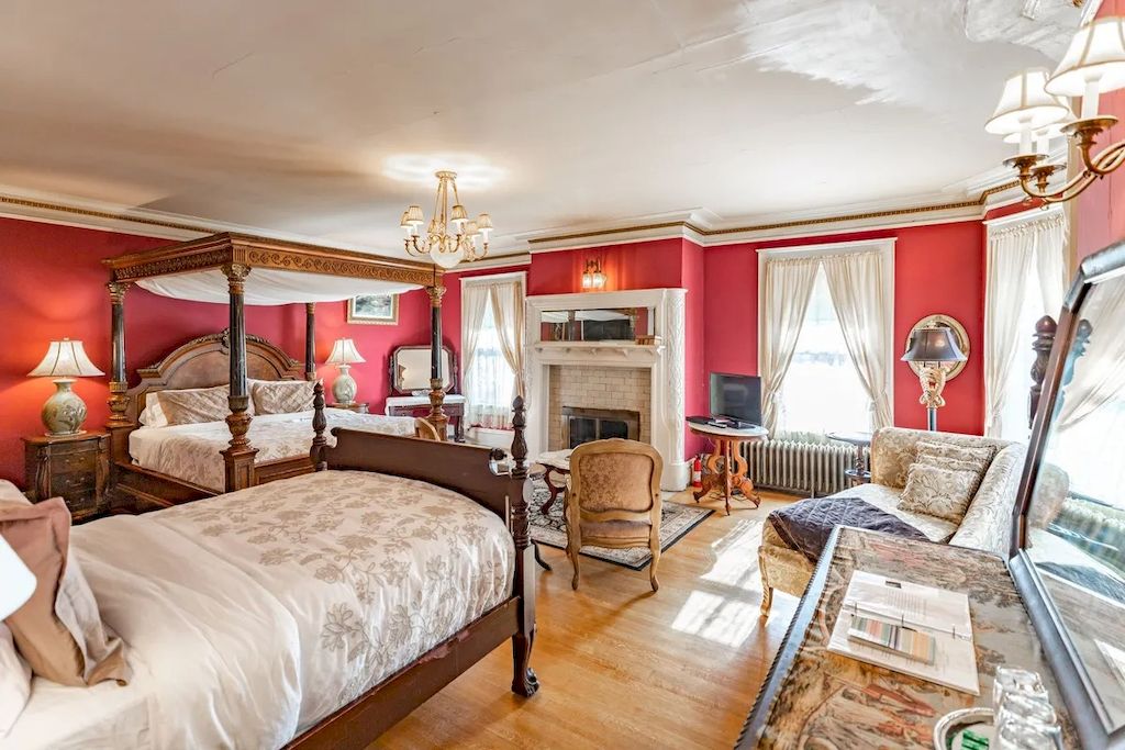 The Home in Michigan is a luxurious home currently being operated as a turn-key bed & breakfast vacation retreat now available for sale. This home located at 320 Tamarack St, Laurium, Michigan; offering 36 bedrooms and 11 bathrooms with 37,880 square feet of living spaces.