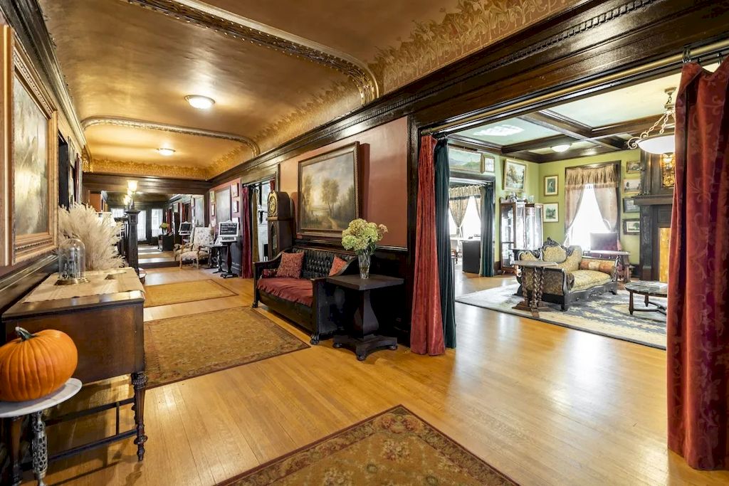 The Home in Michigan is a luxurious home currently being operated as a turn-key bed & breakfast vacation retreat now available for sale. This home located at 320 Tamarack St, Laurium, Michigan; offering 36 bedrooms and 11 bathrooms with 37,880 square feet of living spaces.