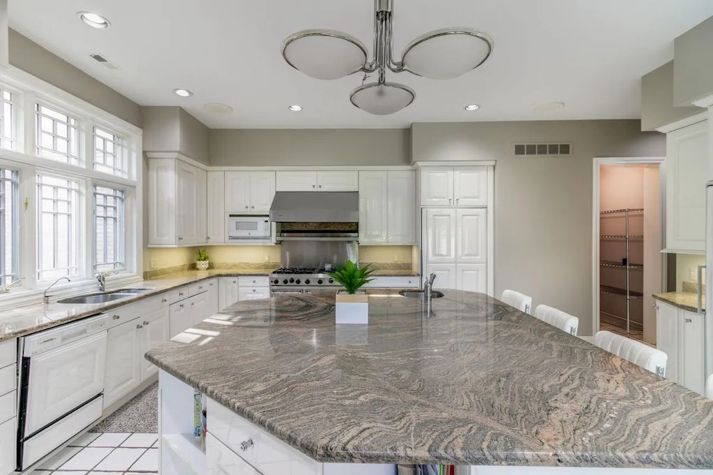 The Home in Michigan is a luxurious home possessing a lovely courtyard with fountain and refined interiors now available for sale. This home located at 1100 Orchard Ridge Rd, Bloomfield Hills, Michigan; offering 06 bedrooms and 11 bathrooms with 14,900 square feet of living spaces.
