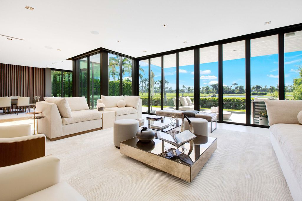 The Miami Beach Home is a new construction home located on a quiet street with direct access to the prestigious La Gorce Country Club now available for sale. This house located at 450 W 62nd St, Miami Beach, Florida
