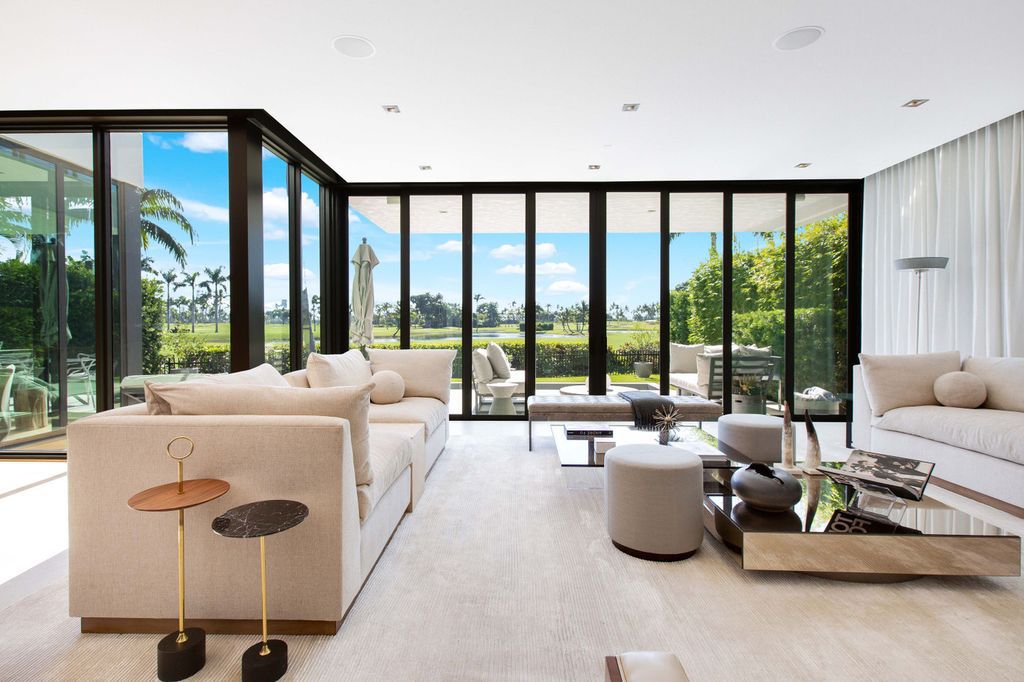 The Miami Beach Home is a new construction home located on a quiet street with direct access to the prestigious La Gorce Country Club now available for sale. This house located at 450 W 62nd St, Miami Beach, Florida