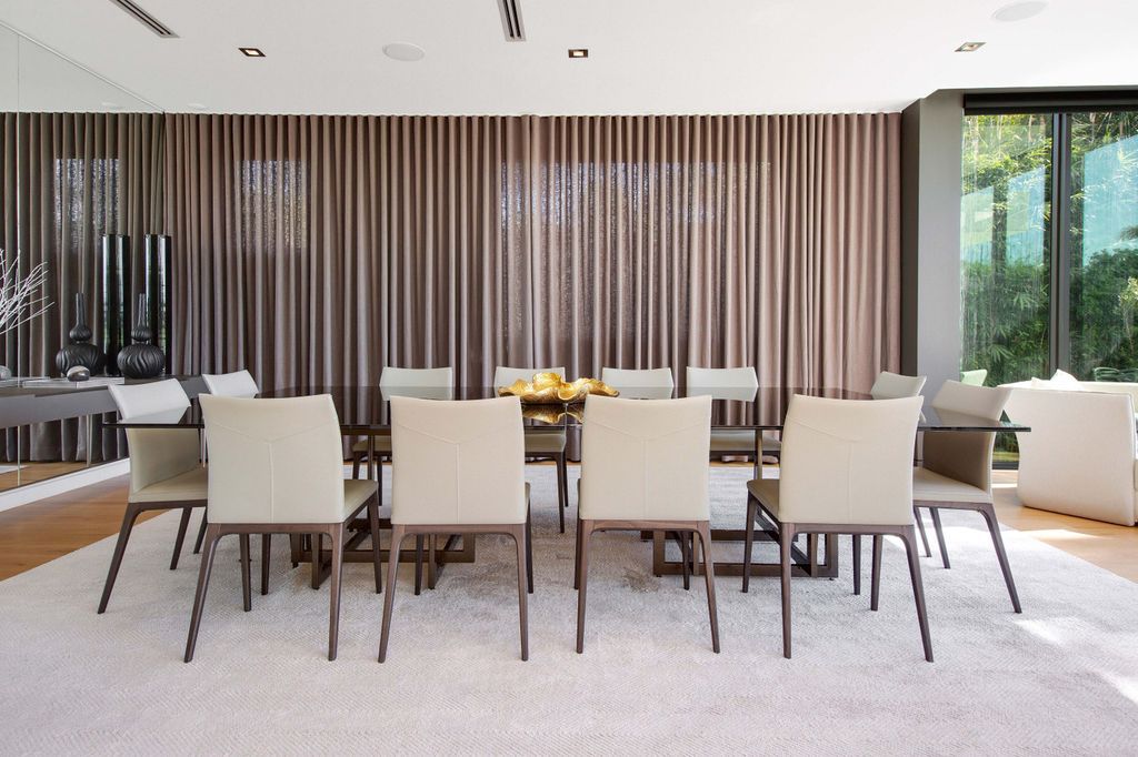 The Miami Beach Home is a new construction home located on a quiet street with direct access to the prestigious La Gorce Country Club now available for sale. This house located at 450 W 62nd St, Miami Beach, Florida