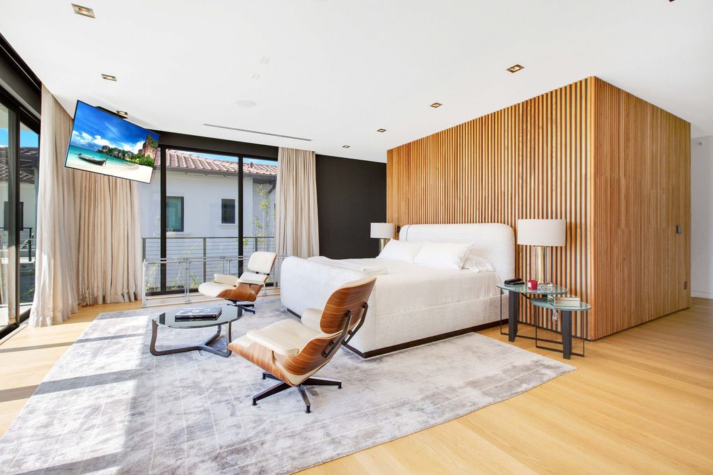 The Miami Beach Home is a new construction home located on a quiet street with direct access to the prestigious La Gorce Country Club now available for sale. This house located at 450 W 62nd St, Miami Beach, Florida