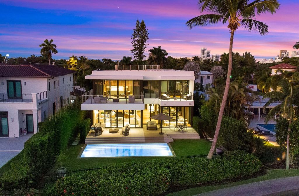 The Miami Beach Home is a new construction home located on a quiet street with direct access to the prestigious La Gorce Country Club now available for sale. This house located at 450 W 62nd St, Miami Beach, Florida